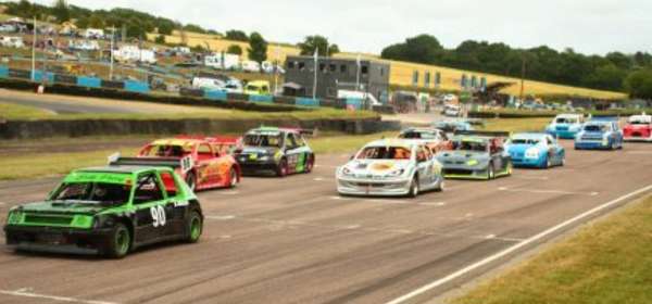 Cars racing around a track