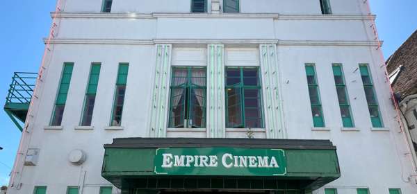 The white and green art-deco exterior of the Empire Cinema in Sandwich.