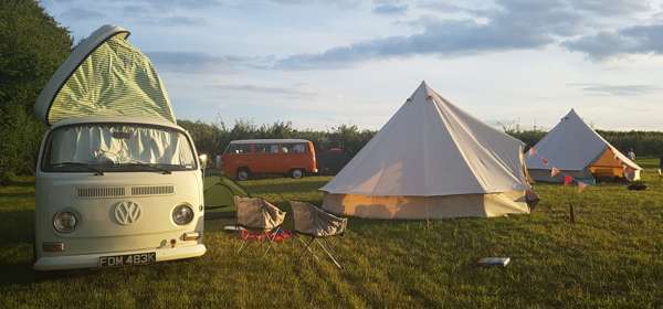 Campsite with tents and campervans