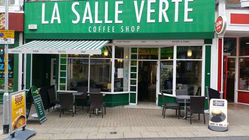 Exterior of La Salle Verte with tables and chaird