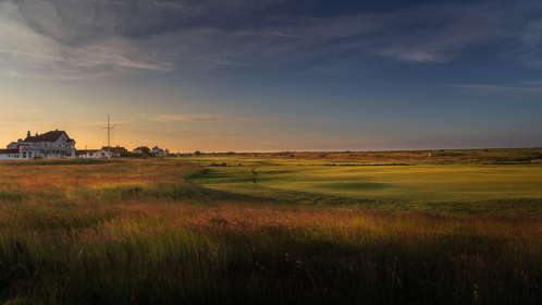 Course and club house at Royal Cinque Ports Golf Club
