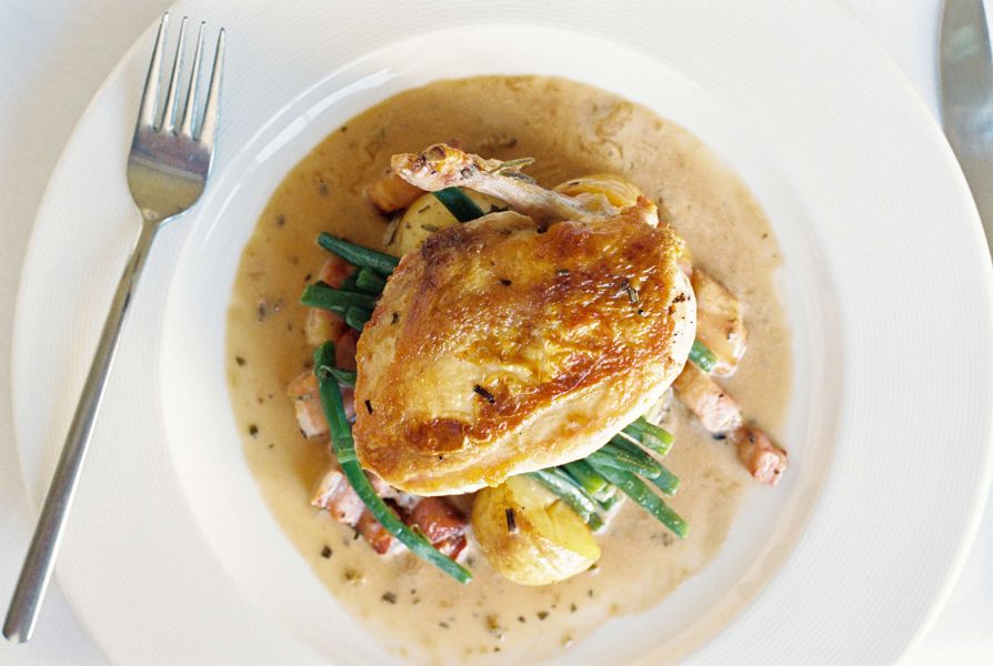 Roast Chicken on a bed of vegetable