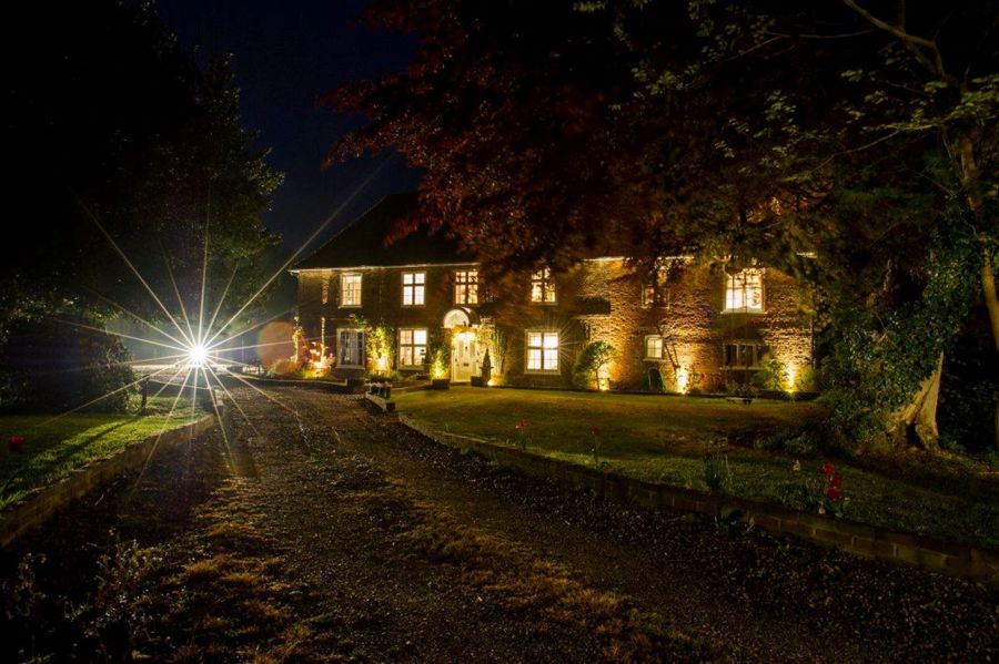 Molland House lit up at night