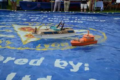 Model boats in a pool