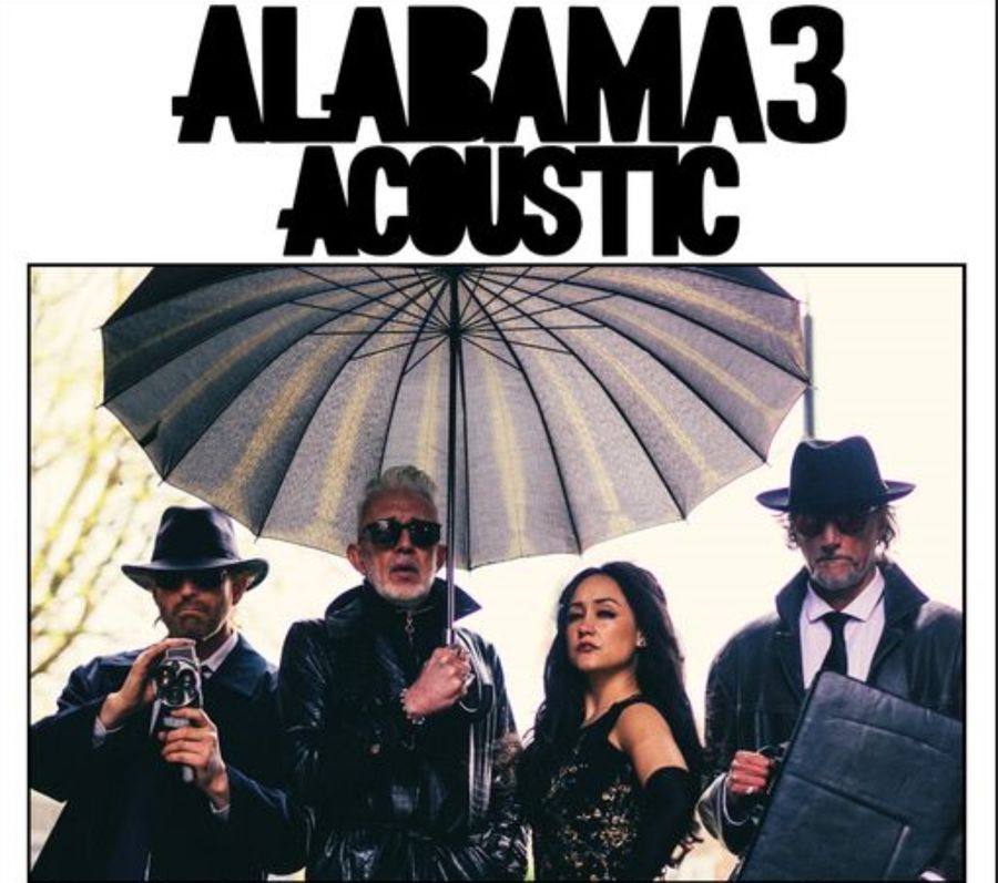 Poster for Alabama 3 with 4 band members in costume with one holding an umbrella over their heads.