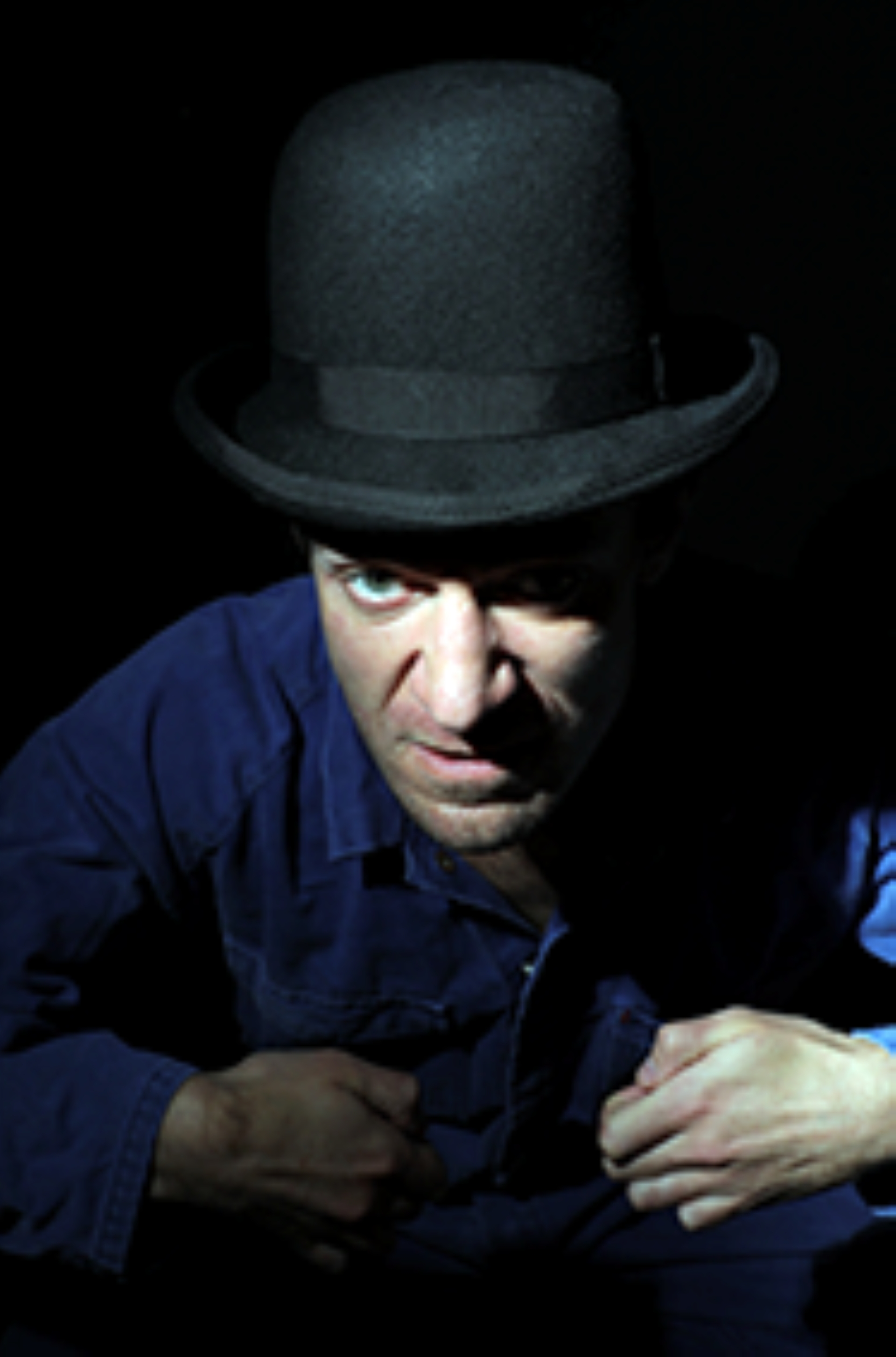 Sam Blythe looking menacing in a bowler hat