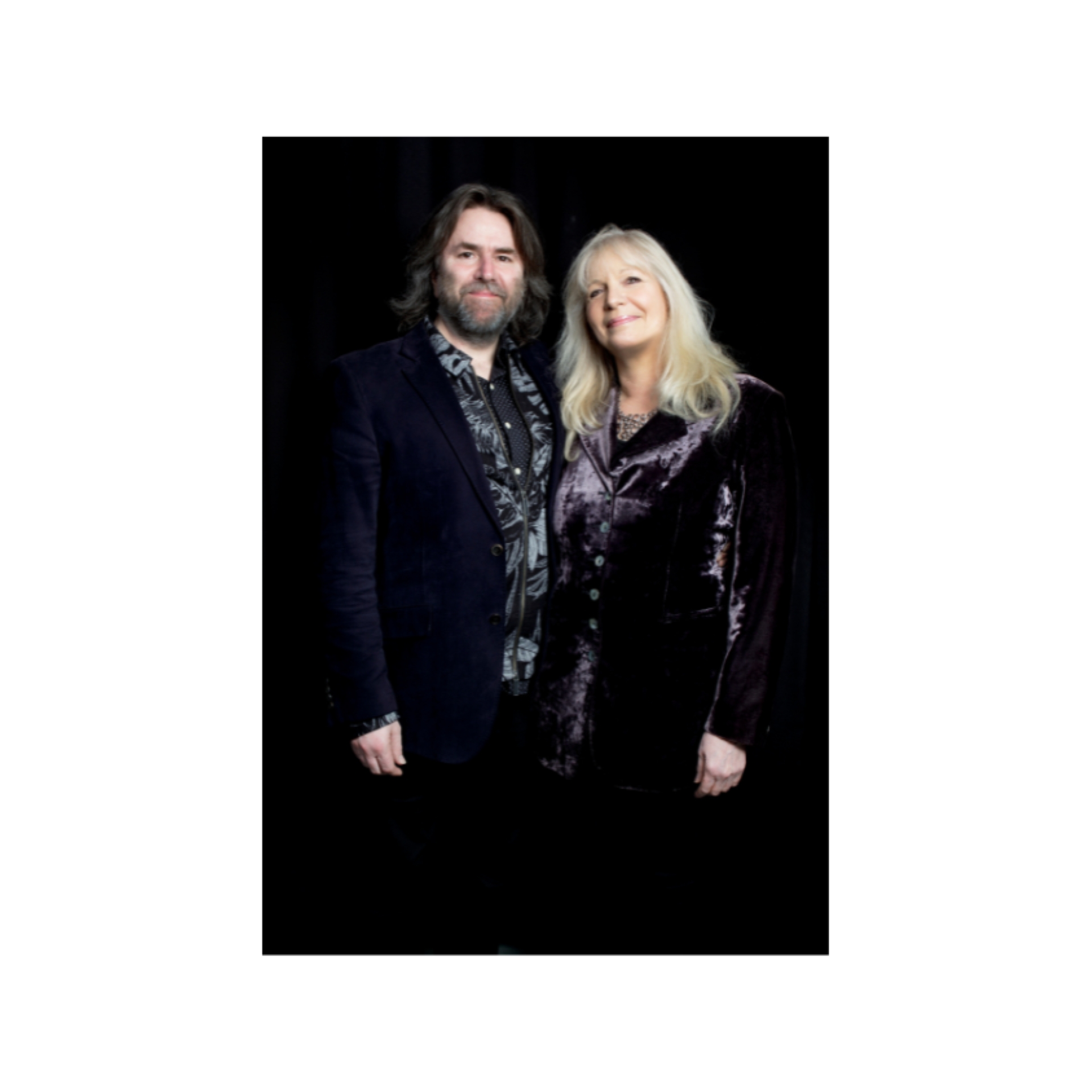 A blond woman and a bearded man who sing as tribute to Carle King & James Taylor, names unknown