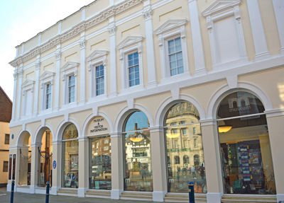 The exterior of Dover Museum - a pillared Victorian facade painted cream and white