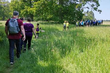 A group walking through a field