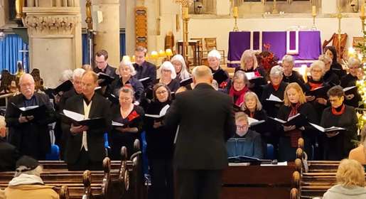 Photo of the Dover Choral Society singing in church