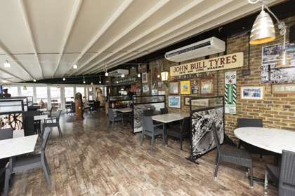 Tables and chairs in Cullins Yard Restaurant