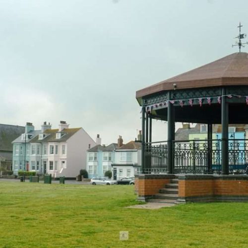 The bandstand on Walmer Green with buildings on The Strand in the background