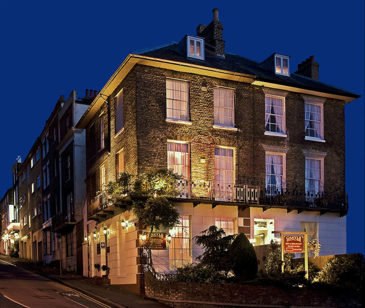 Castle House lit up at night