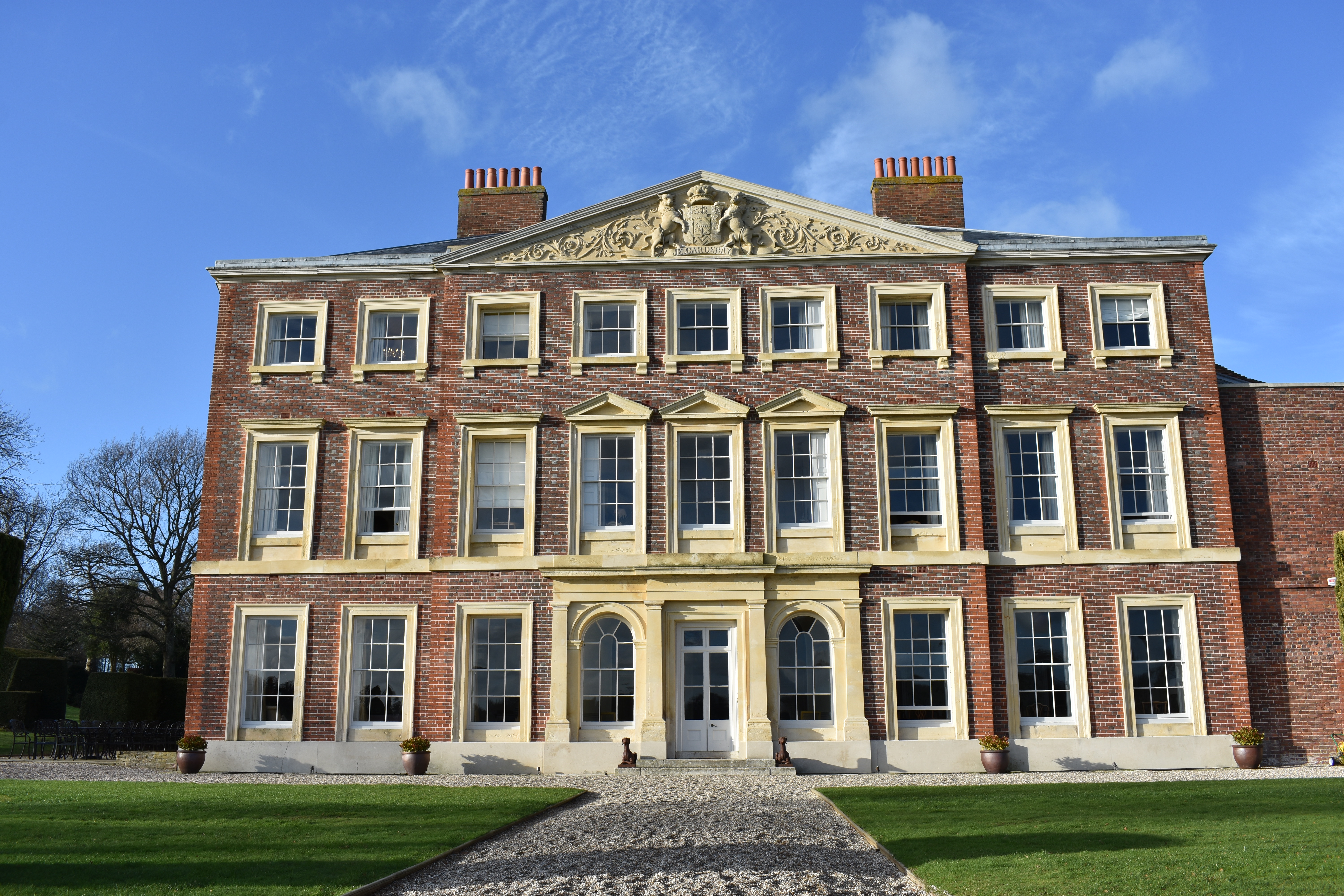 The frontage of a magnificent country house.