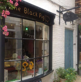 The Black Pig Butcher's window