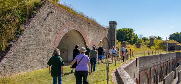 A group of walkers exploring the upper casemates at Fort Burgoyne, Dover