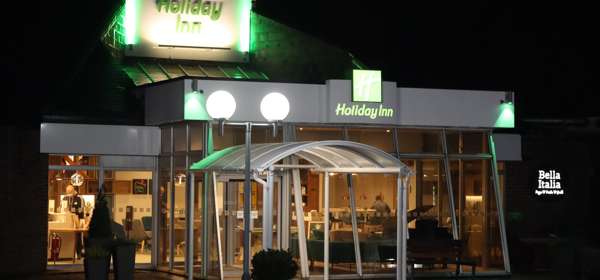 The exterior of the Holiday Inn Dover at night