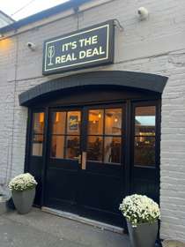 Exterior of It's The Real Deal