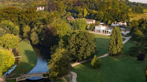 Aerial view showing the grounds plus cafe at Kearsney Abbey