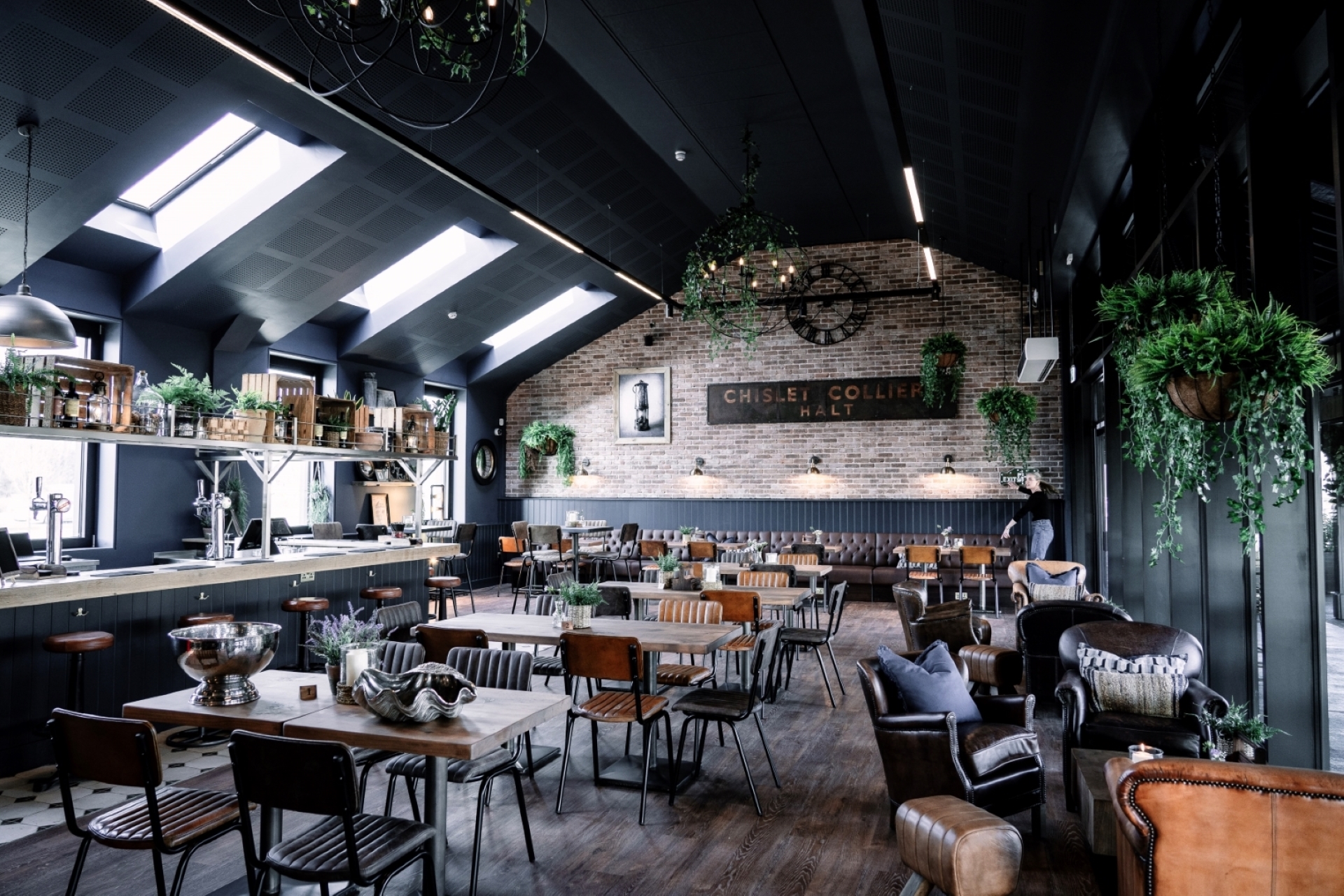 Interior of a cafe with leather chairs.