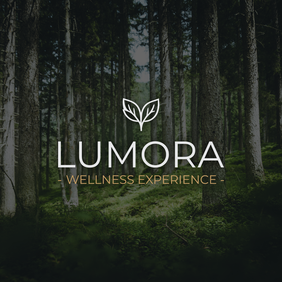 Forest scene with Lumora logo overlayed