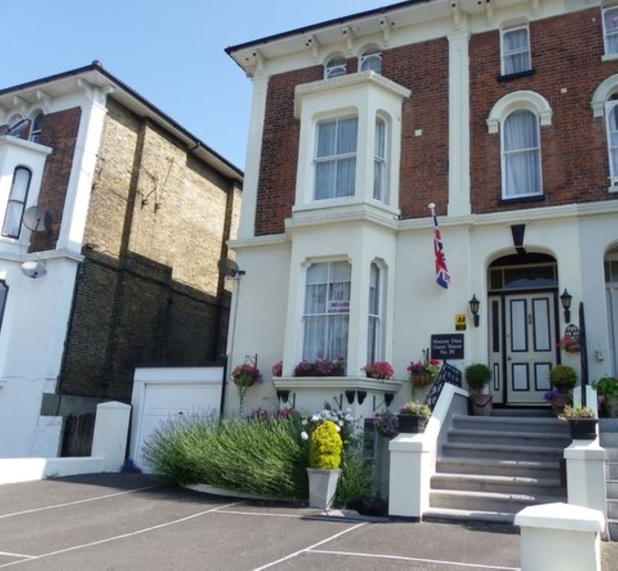 Front entrance with steps up to front door