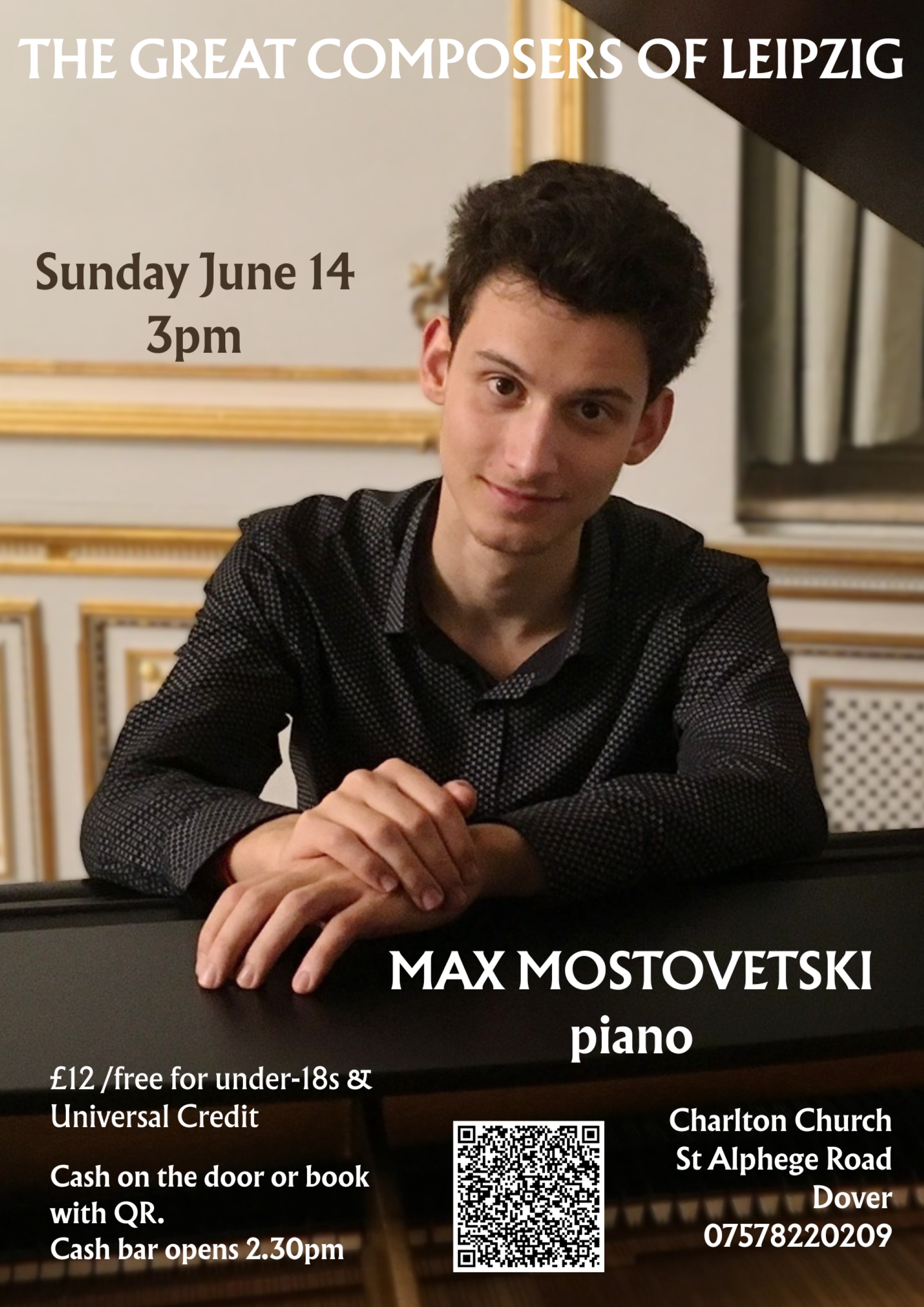 Max sitting in front of a piano