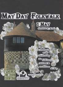 A building in Sandwich surrounded by flowers