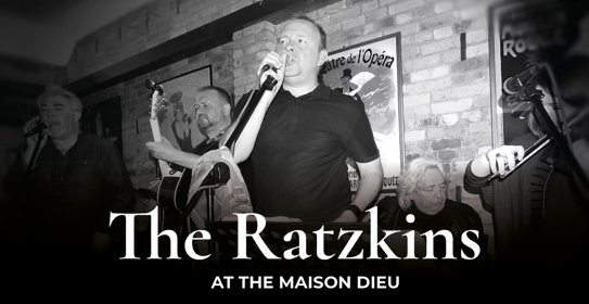 a black and white photo of the band
