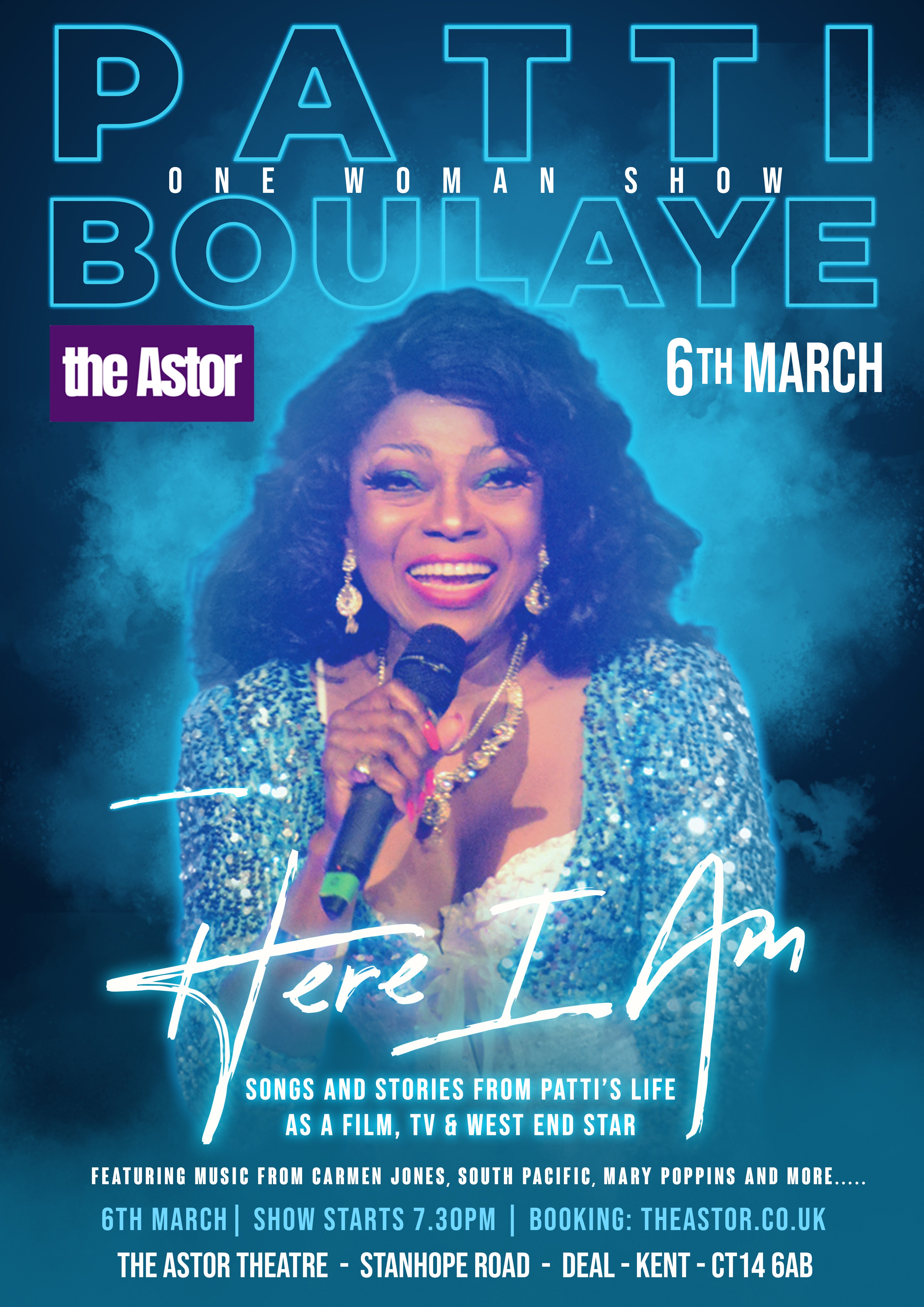 Head and shoulders of Patti holding a microphone