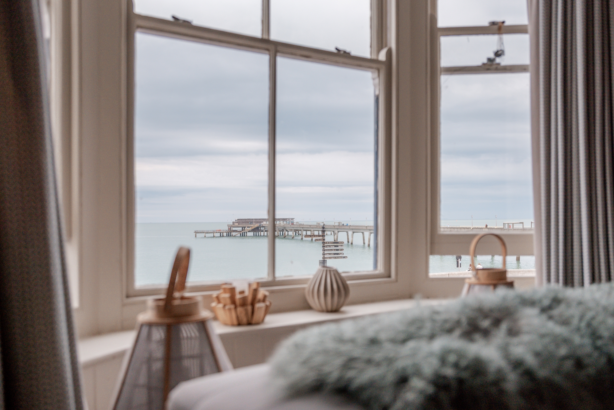 View from a window of the sea and Deal Pier.