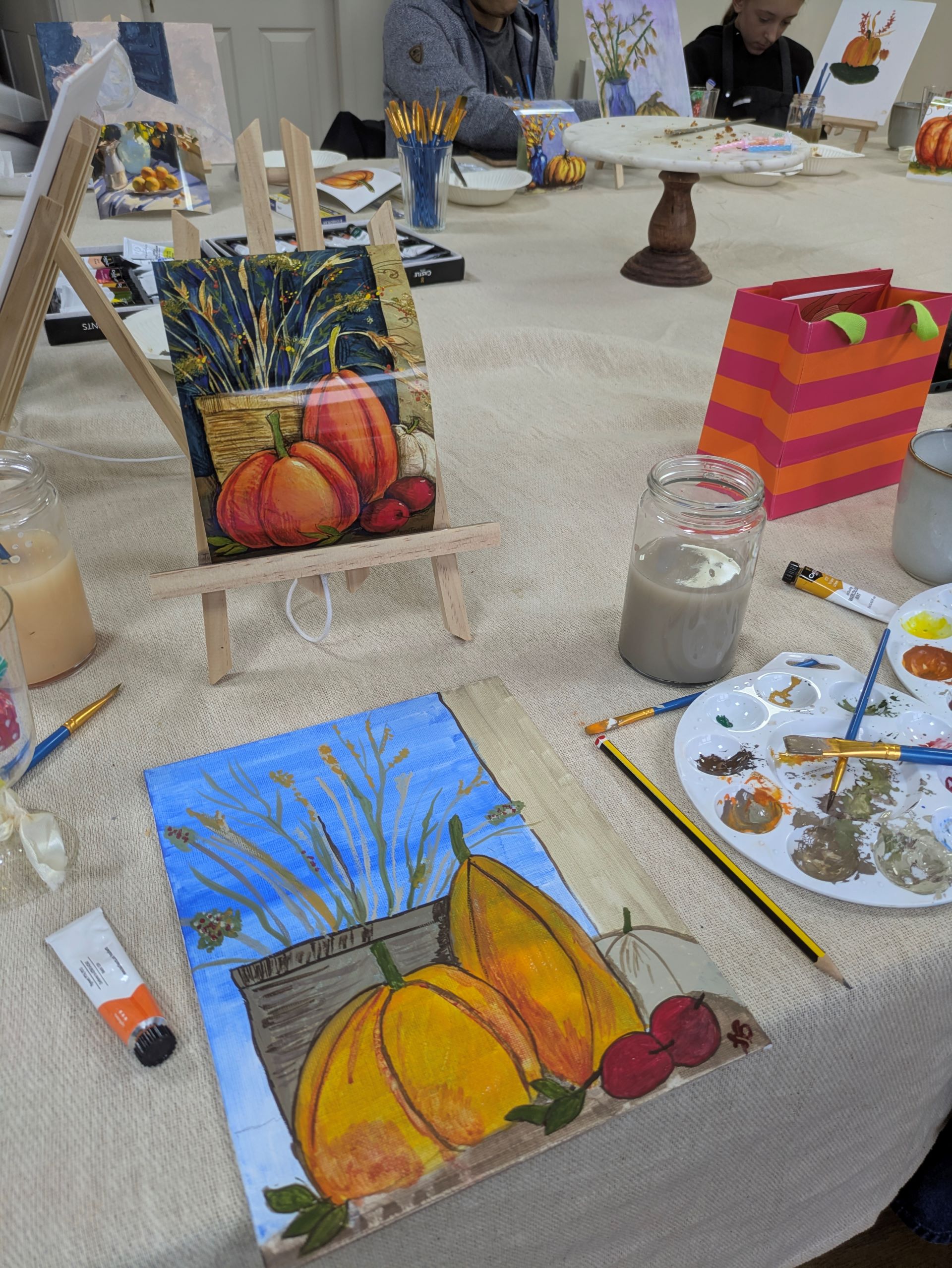 A table with painting equipment laid out.