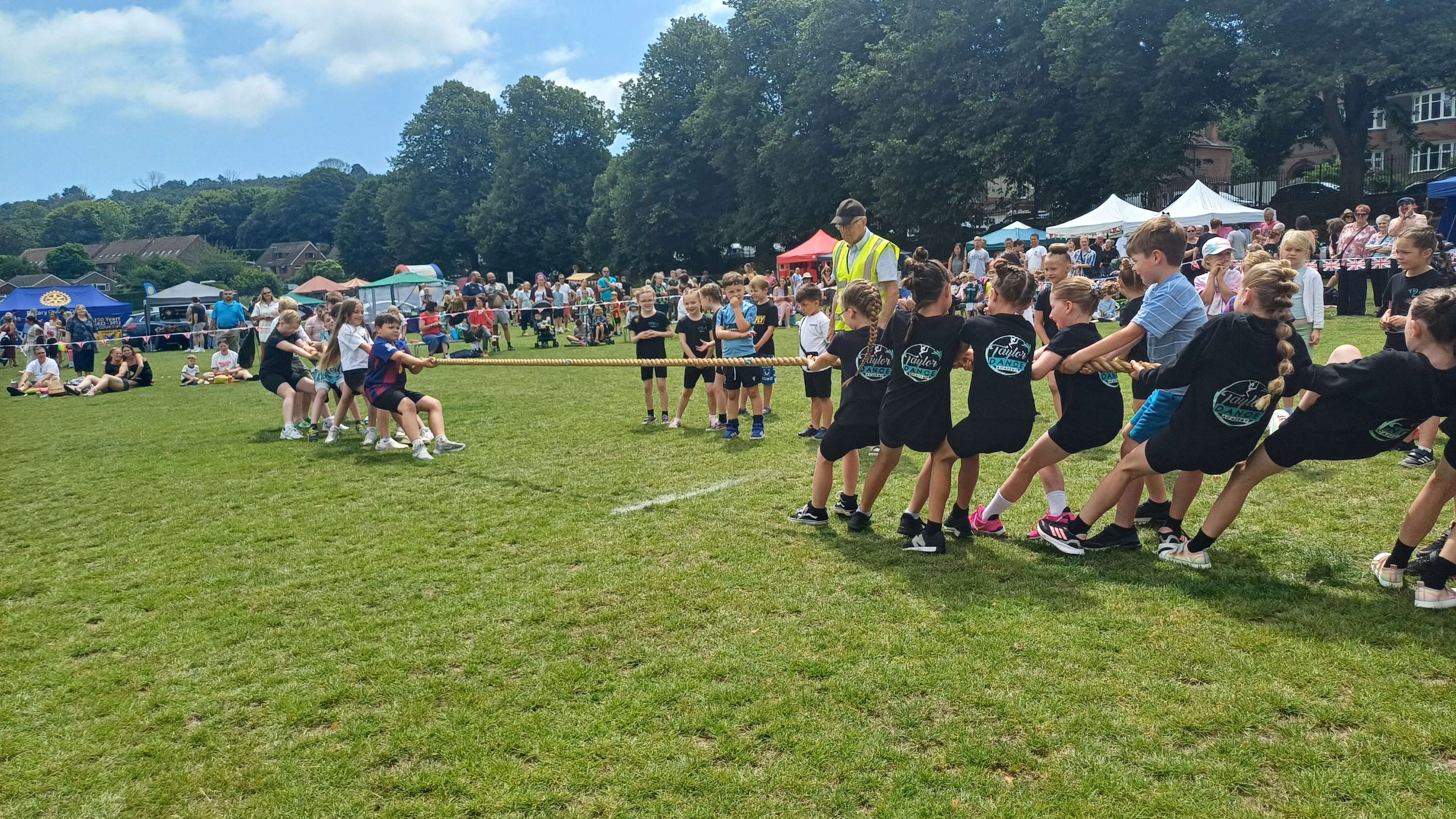 Children involved in a game of tug a war