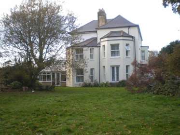 View of Rolles Court set in it's own garden