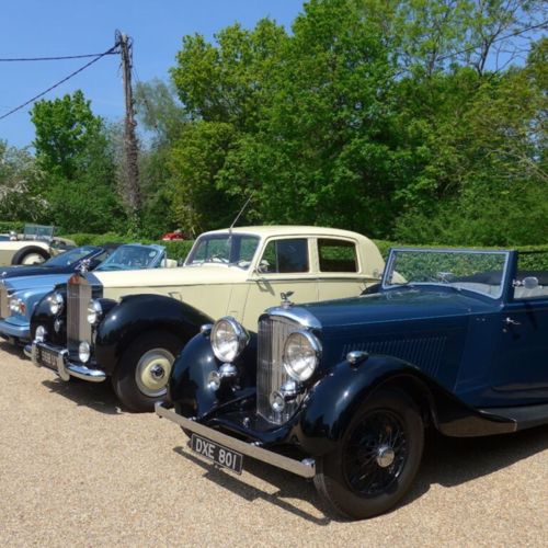 Image of a row of Rolls Royce cars