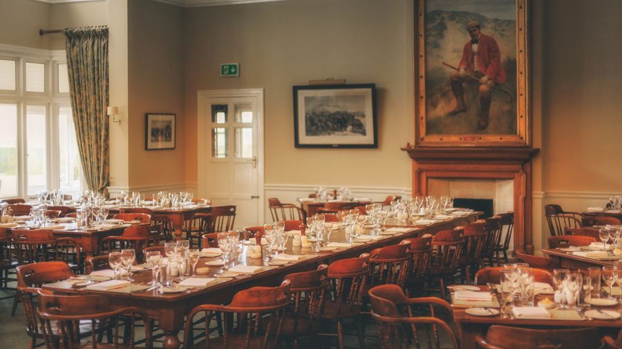 A formal dining room set for dinner