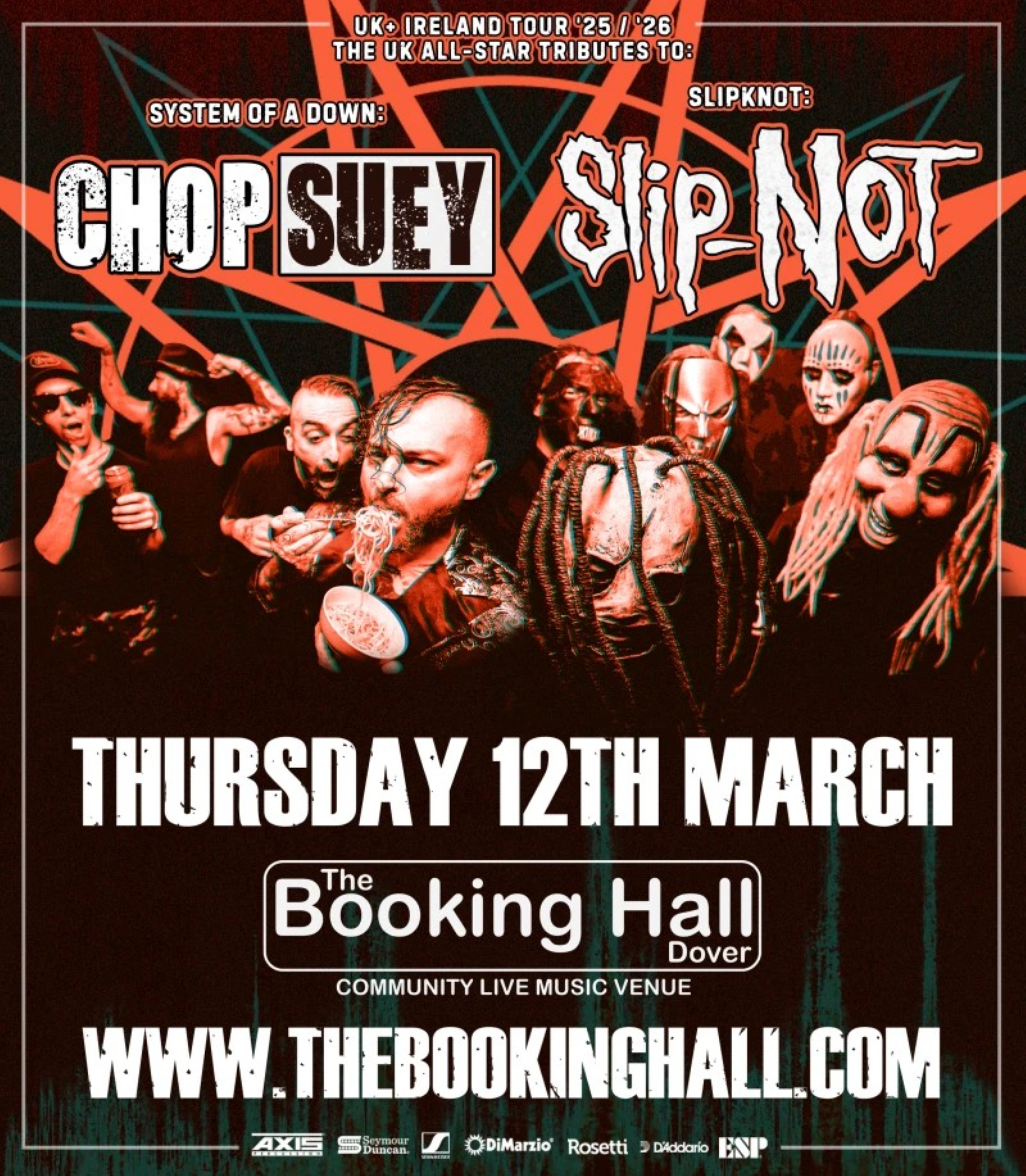 A group of musicians some wearing face masks of a clown & an alien. One also eating a bowl of noodles.