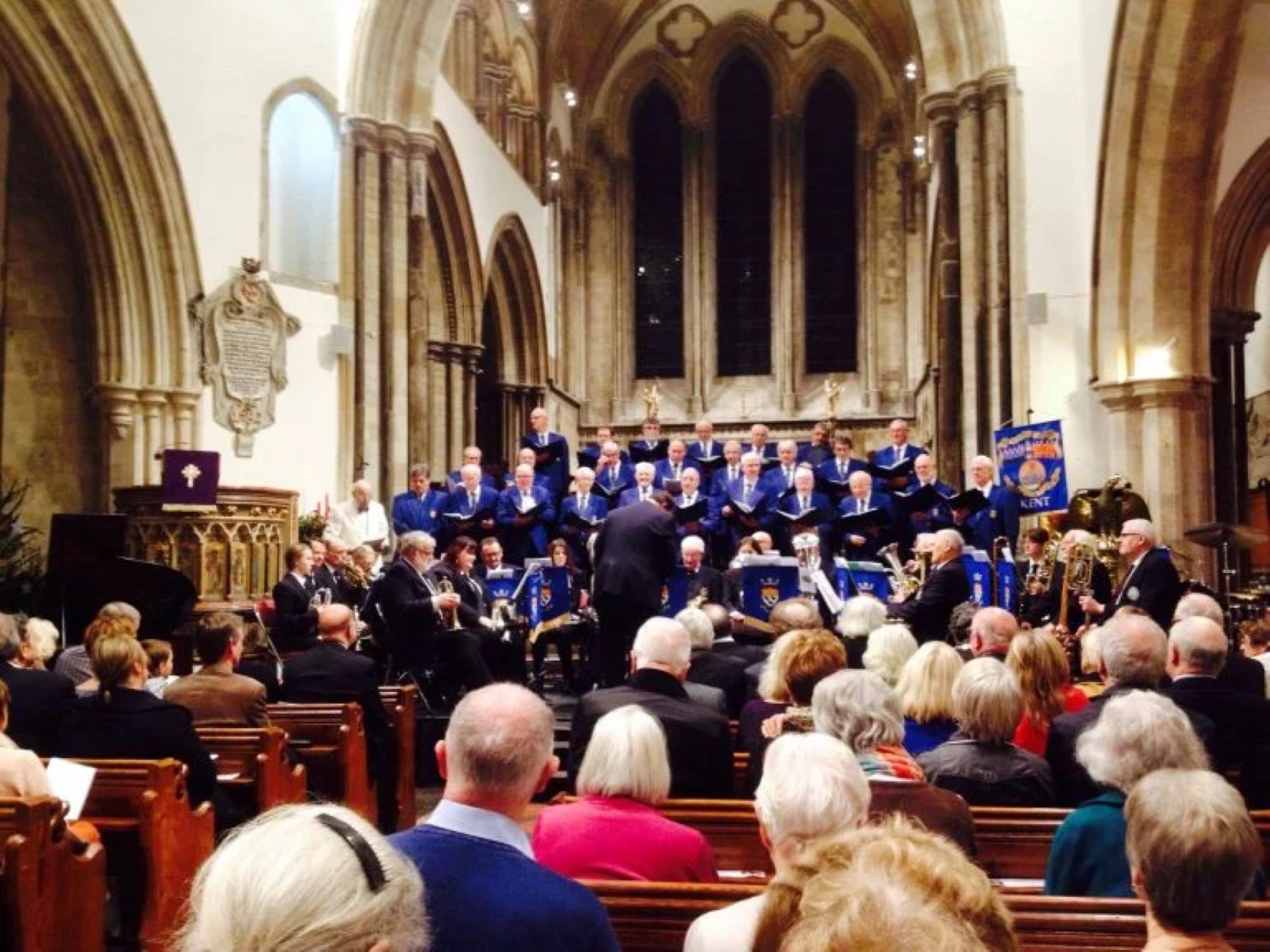 Members of the choir singing in a church