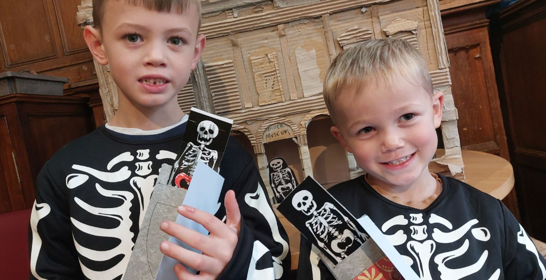 Two children at a Halloween workshop