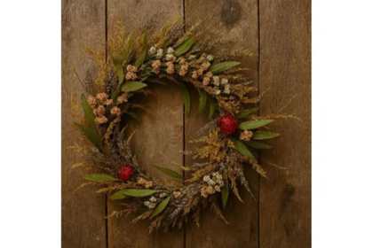 Spring wreath with evergreen plants