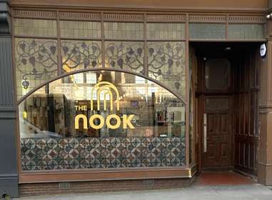 Stained glass front window of The Nook cafe