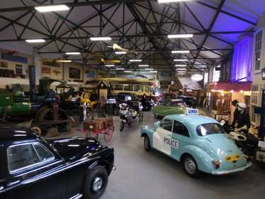 Classic cars on display with the museum