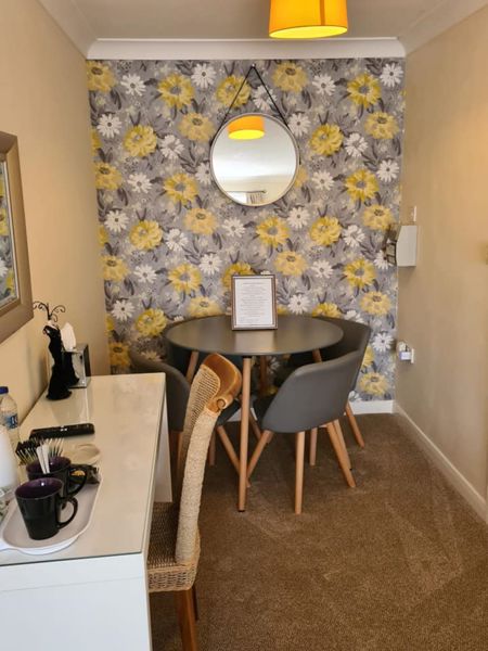 Room with table and seating area