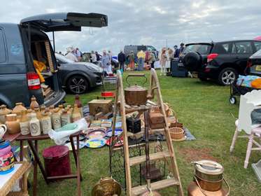Shoppers at outdoor market stalls at Walmer Brocante in Deal