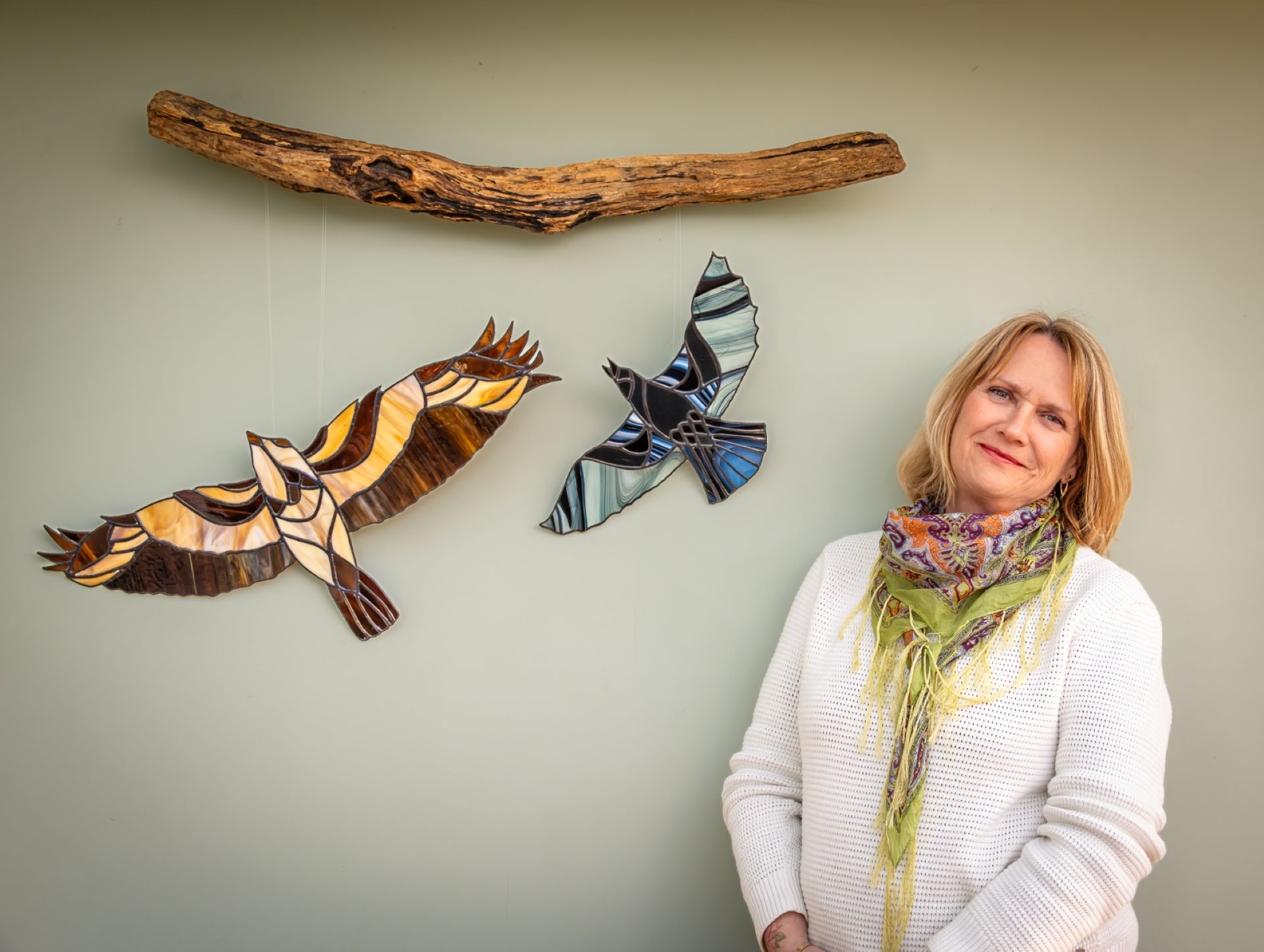 A portrait of the artist and examples of her work