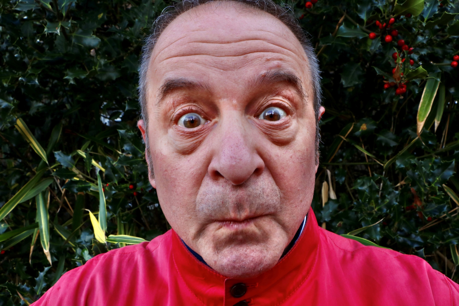 Head of Mark Thomas pursing his lips